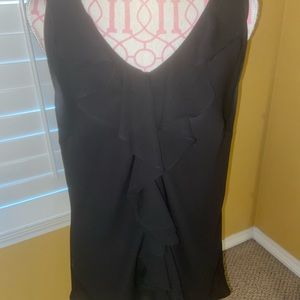 Sleeveless top with ruffles